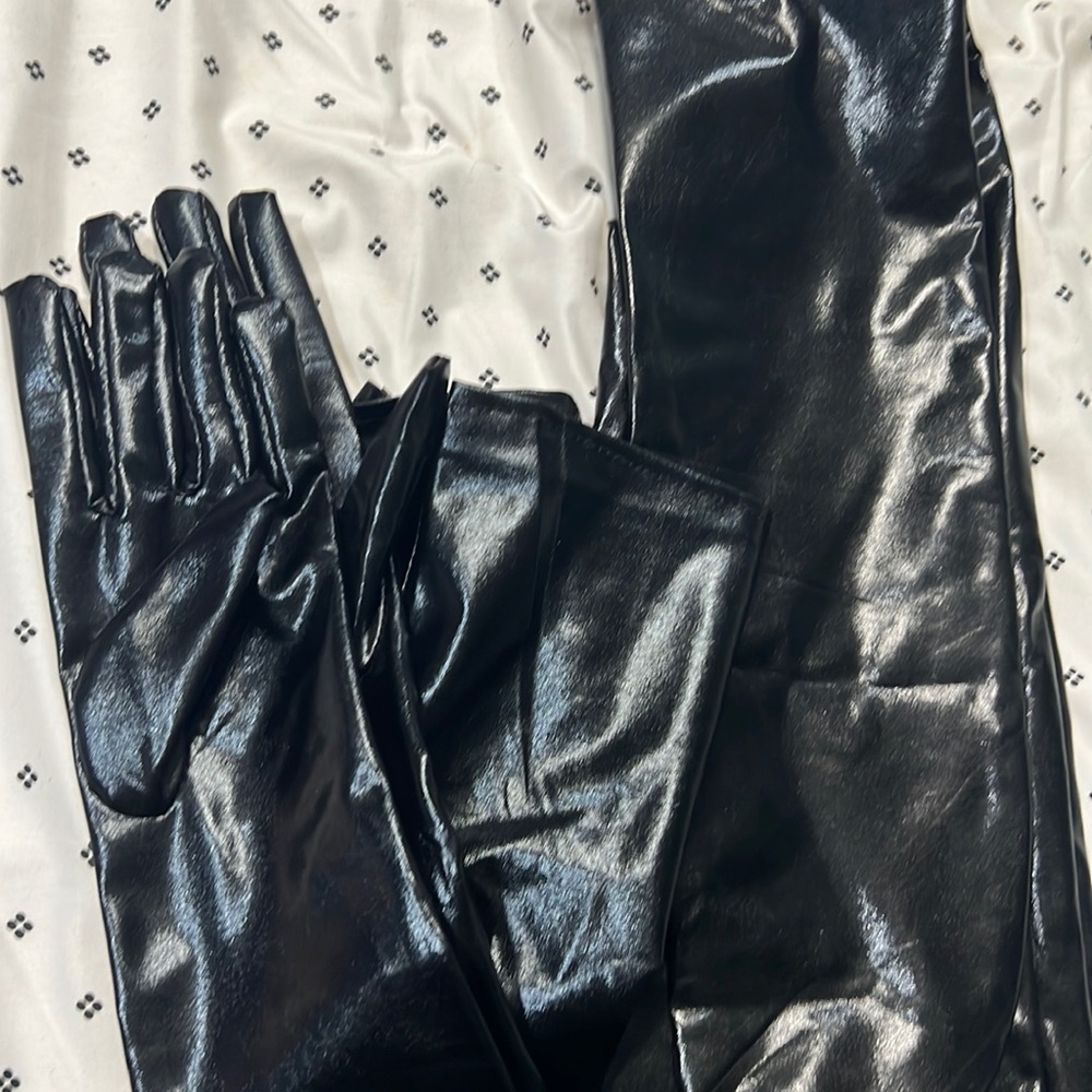 - Long latex gloves and stockings in black
